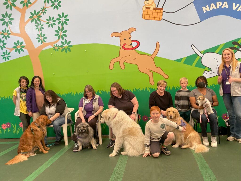 People and dogs at a community center event